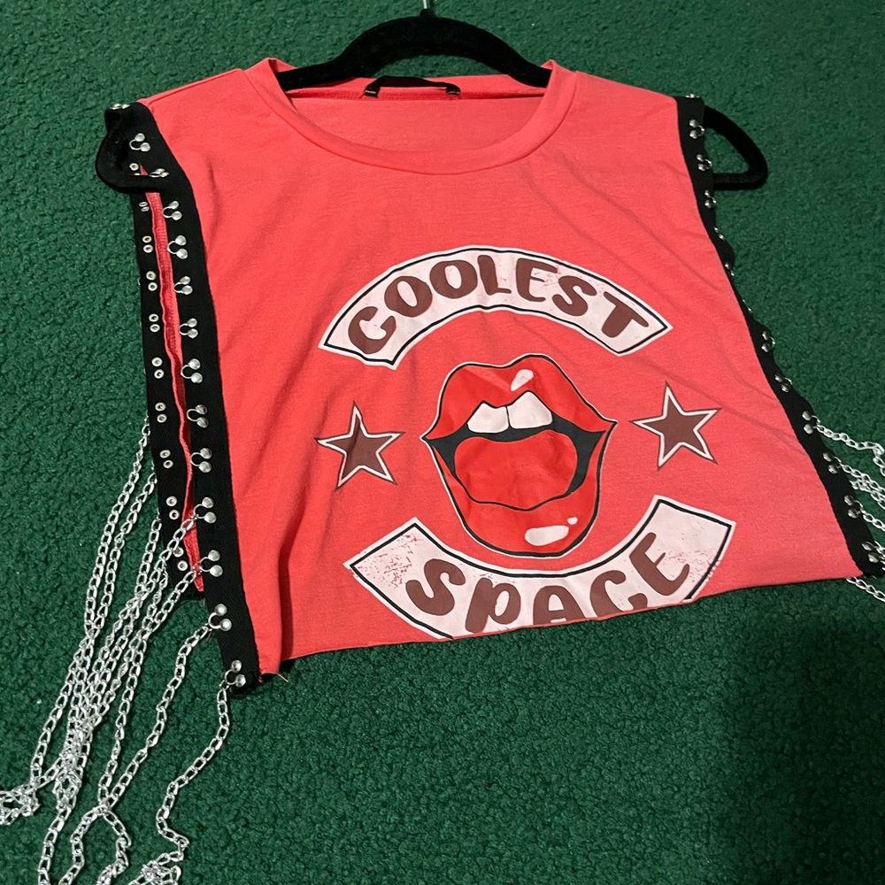 Red graphic top with chain details